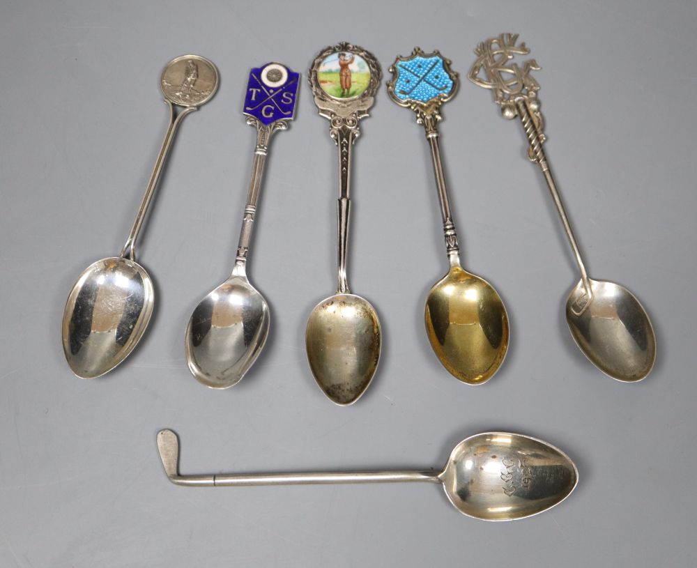 Six assorted golfing related silver teaspoons including three with enamel,